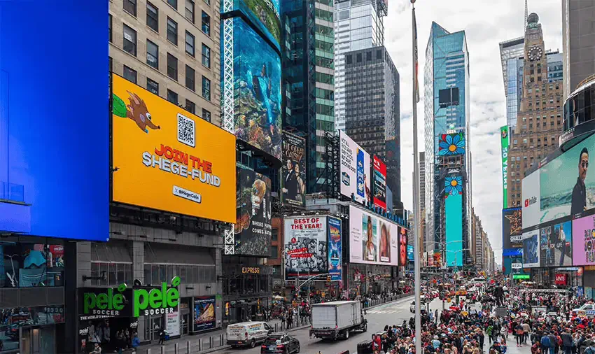 Billboard in Times Square, New York City, showing a Hege ad.